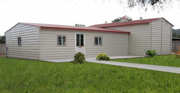 Kit home with metal panels