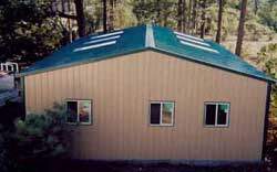 Garage with metal panels applied