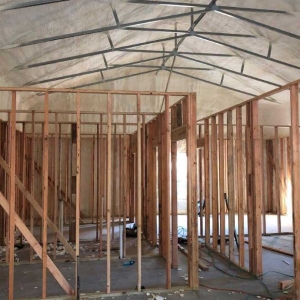 Metal home with wood interior framing